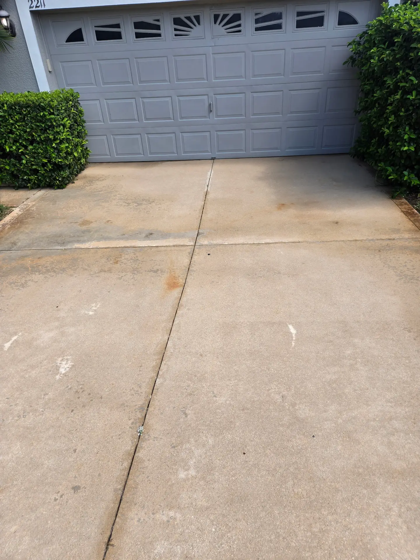 Two-Car Driveway after pressure washing in Sorrento FL