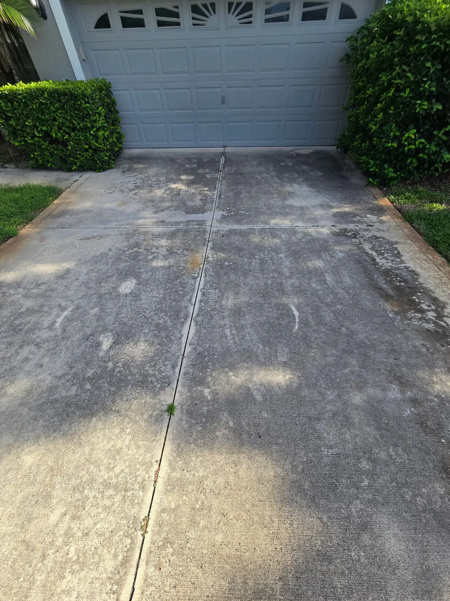 Two-Car Driveway before pressure washing in Sorrento FL