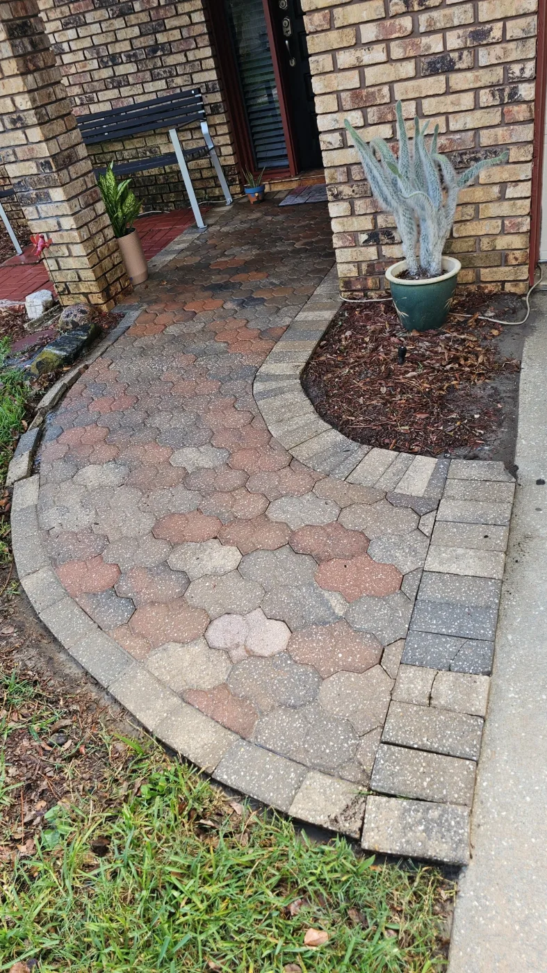 The same paver walkway cleaned to its original color by KraziKleen